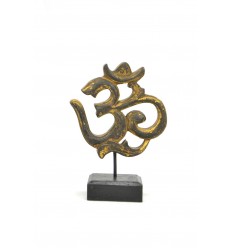 Statuette symbol 'm (Aum) carved wood. Indian decoration.