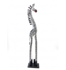 Great statue zebra standing in the wood, ethnic decoration african.