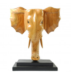 Grande testa di elefante a muro in legno, nello stile di un trofeo di caccia.