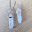 Necklace with pendant peak crystal of natural rock. Strength and Purification.